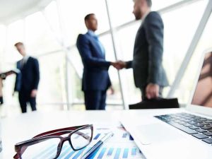 image showing financial professionals investing in blockchain and cryptocurrency