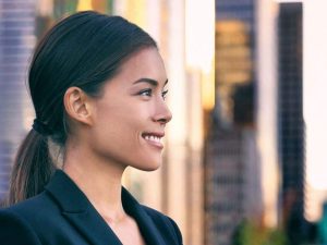 photo of female graduate of blockchain for lawyers certificate where she gained cutting edge knowledge of block chain technology and its implications on developing smart and legal contracts and transacting across secure, trusted online ledgers